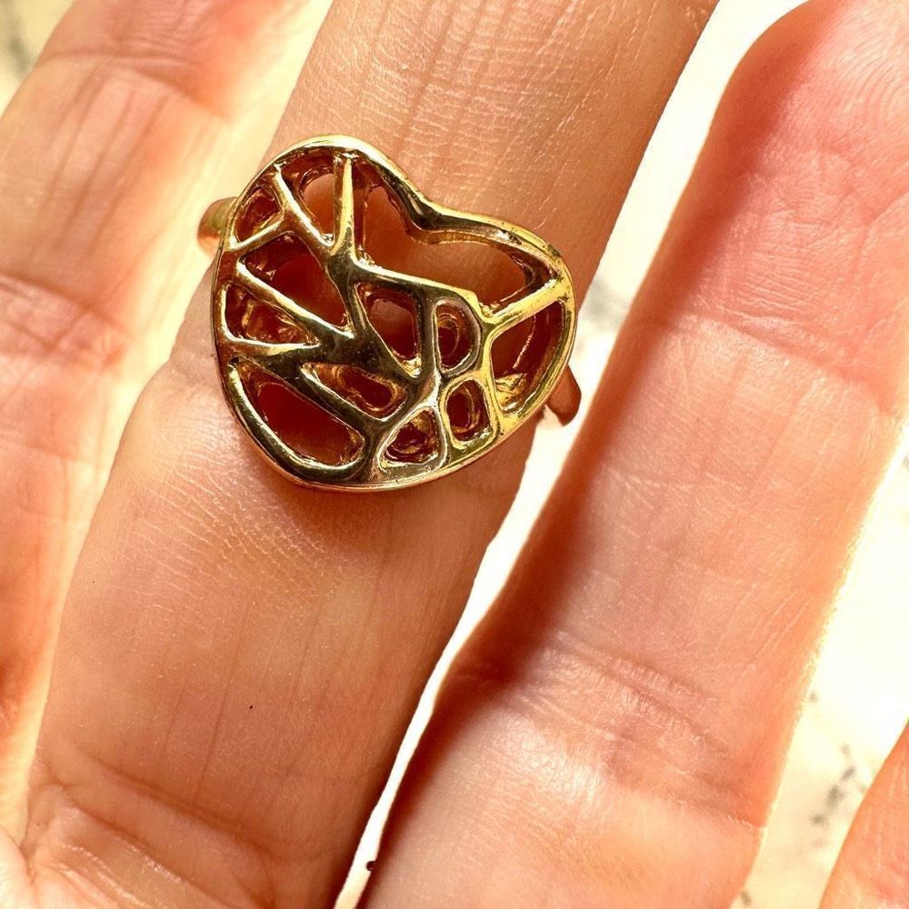 Gold tone heart ring